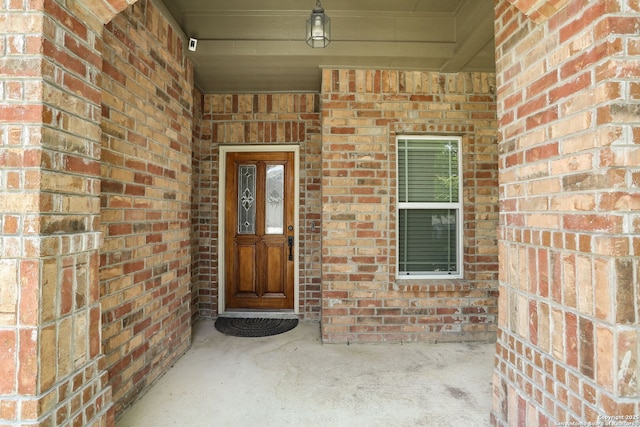 1415 Crane Ct, San Antonio, TX 78245 - doorway to property with brick siding