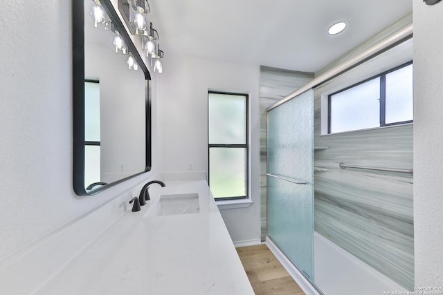 16415 Old Stable, San Antonio, TX 78247 - bathroom featuring a shower with door, vanity, wood finished floors, and recessed lighting