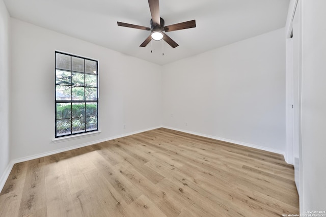 16415 Old Stable, San Antonio, TX 78247 - empty room featuring light wood-style flooring, baseboards, and ceiling fan