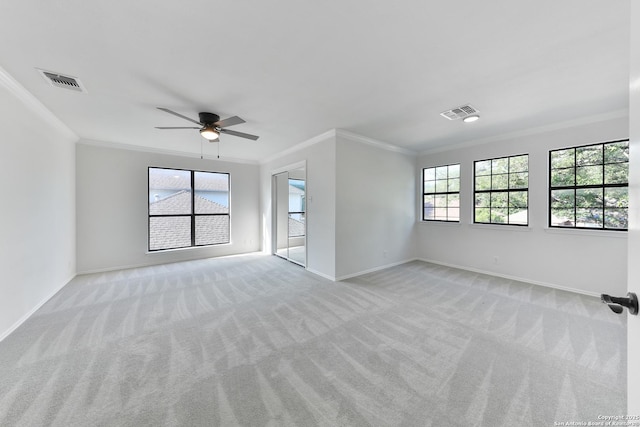 16415 Old Stable, San Antonio, TX 78247 - unfurnished room featuring light colored carpet, healthy amount of natural light, baseboards, and ornamental molding