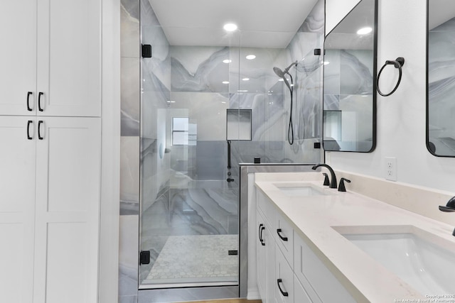 16415 Old Stable, San Antonio, TX 78247 - bathroom with a marble finish shower, double vanity, and recessed lighting