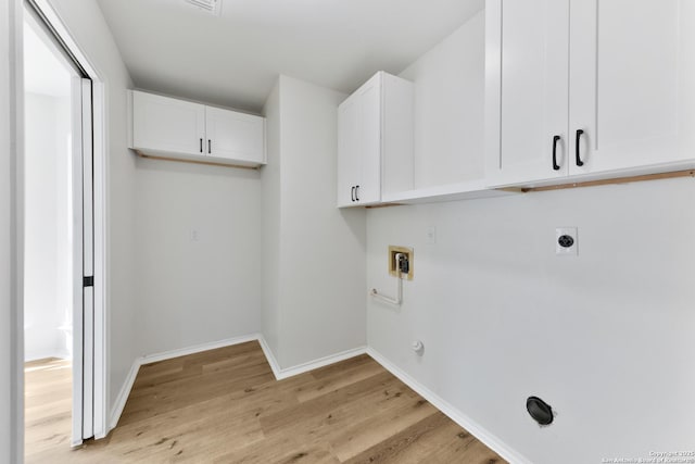 16415 Old Stable, San Antonio, TX 78247 - washroom with electric dryer hookup, light wood-style flooring, washer hookup, and baseboards