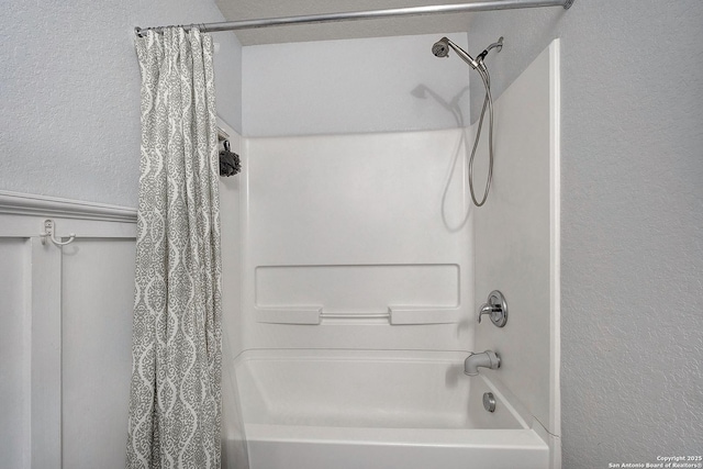 11907 Pure Silver, San Antonio, TX 78254 - full bathroom featuring shower / bath combo with shower curtain and a textured wall