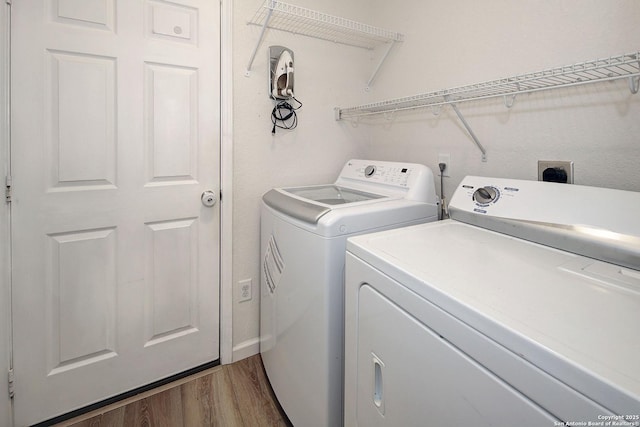 11907 Pure Silver, San Antonio, TX 78254 - washroom with washing machine and dryer and wood finished floors
