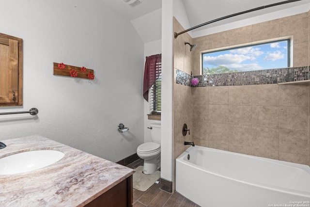 151 Native Pecan, Canyon Lake, TX 78133 - bathroom with vanity, toilet, wood finished floors, bathing tub / shower combination, and vaulted ceiling