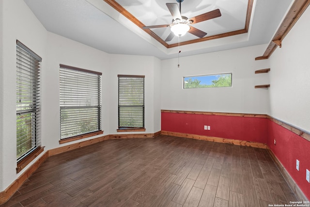 151 Native Pecan, Canyon Lake, TX 78133 - unfurnished room featuring a raised ceiling, wood finished floors, and baseboards