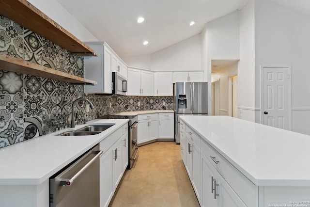 942 Lightstone, San Antonio, TX 78258 - kitchen featuring appliances with stainless steel finishes, a sink, decorative backsplash, open shelves, and light countertops