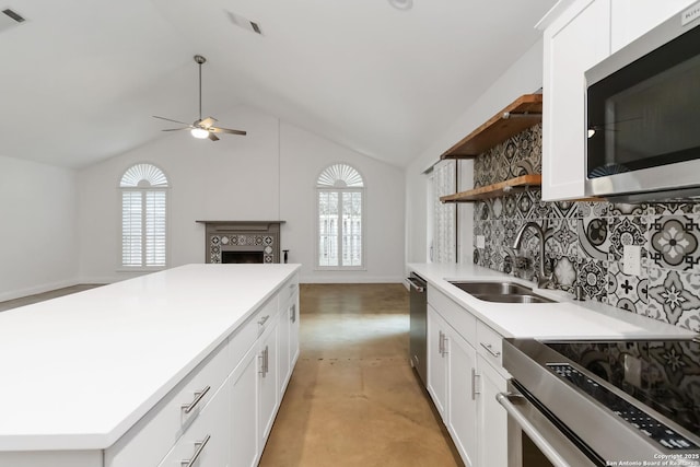 942 Lightstone, San Antonio, TX 78258 - kitchen featuring stainless steel appliances, a sink, open shelves, a ceiling fan, and open floor plan