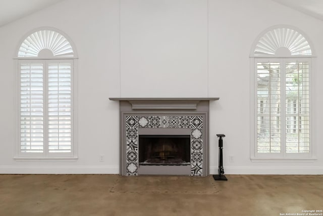 942 Lightstone, San Antonio, TX 78258 - detailed view of a tile fireplace and baseboards