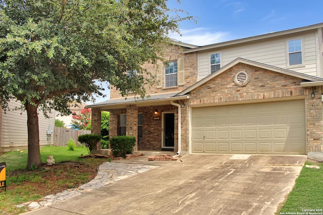 7527 Escada Crst, San Antonio, TX 78254 - view of front facade with driveway, brick siding, and a garage