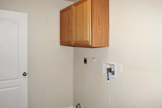 7527 Escada Crst, San Antonio, TX 78254 - laundry room with cabinet space, electric dryer hookup, and hookup for a washing machine