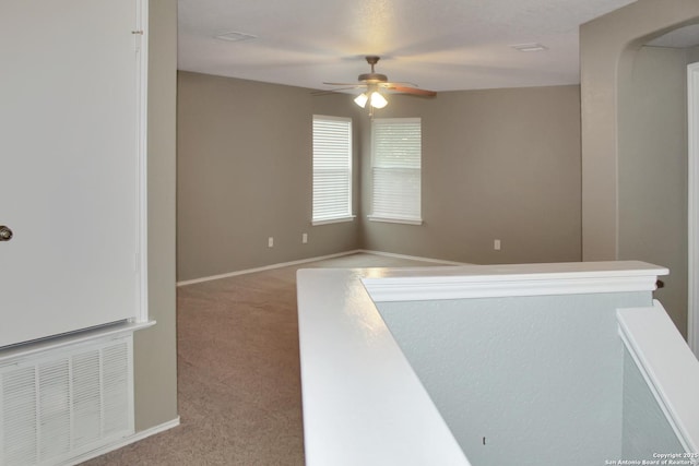 7527 Escada Crst, San Antonio, TX 78254 - spare room with ceiling fan, carpet, and baseboards