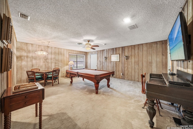 11 El Norte Cir, Uvalde, TX 78801 - rec room featuring a textured ceiling, carpet flooring, a ceiling fan, pool table, and wooden walls