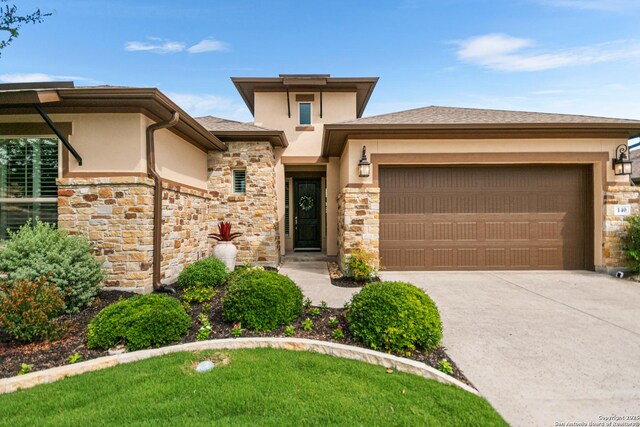 140 Cinnamon Crk, Boerne, TX 78006 - prairie-style house featuring stone siding, stucco siding, and a garage