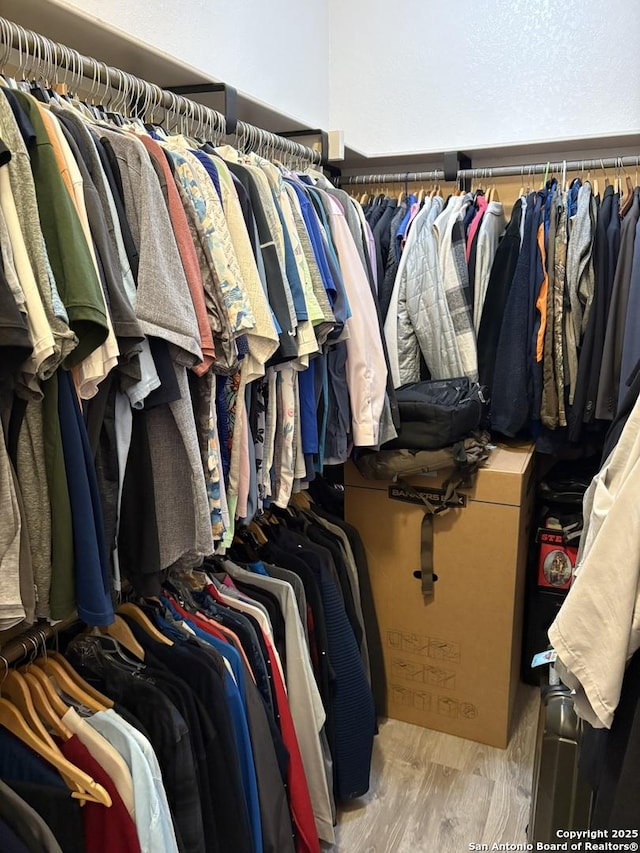 636 Carriage House # 30, Spring Branch, TX 78070 - spacious closet featuring wood finished floors