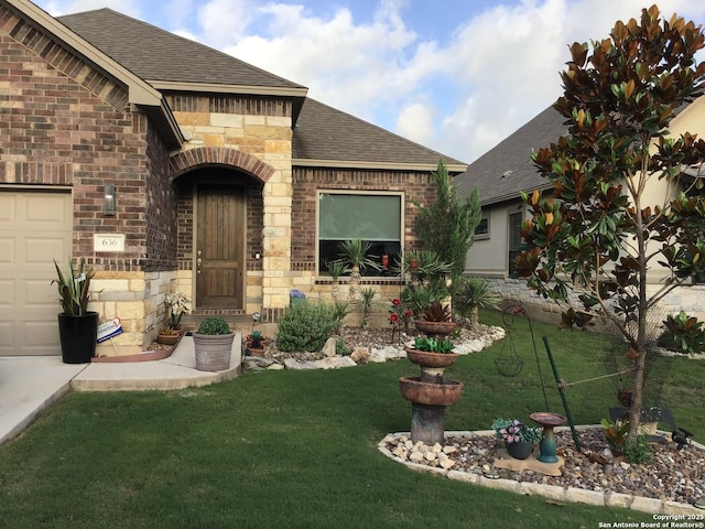 636 Carriage House # 30, Spring Branch, TX 78070 - entrance to property with roof with shingles, stone siding, a lawn, brick siding, and a garage