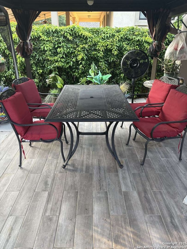 636 Carriage House # 30, Spring Branch, TX 78070 - wooden deck featuring outdoor dining area