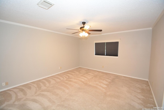 426 Twin Point Crk, Schertz, TX 78154 - empty room featuring light carpet, a ceiling fan, crown molding, and baseboards