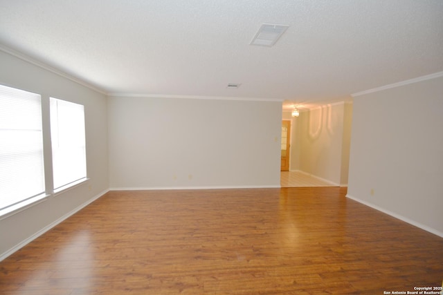 426 Twin Point Crk, Schertz, TX 78154 - unfurnished room featuring crown molding, wood finished floors, and baseboards