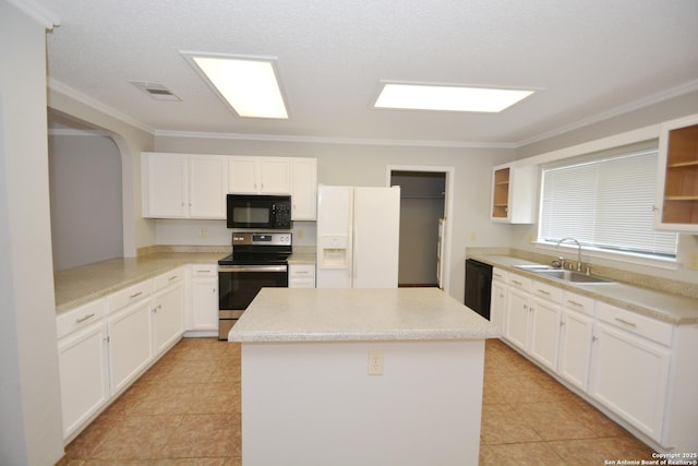 426 Twin Point Crk, Schertz, TX 78154 - kitchen featuring black appliances, a sink, a center island, white cabinets, and ornamental molding