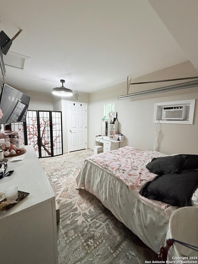 2407 Aiken, San Antonio, TX 78237 - carpeted bedroom with a wall mounted air conditioner