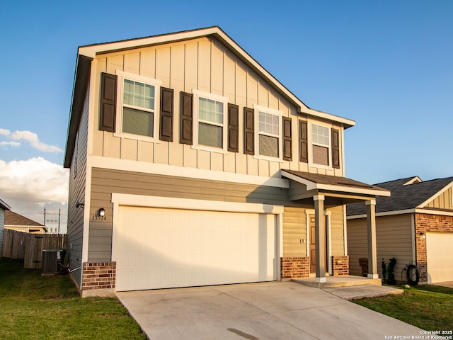13514 Flower Pond, Saint Hedwig, TX 78152 - view of front of house featuring board and batten siding, brick siding, and concrete driveway