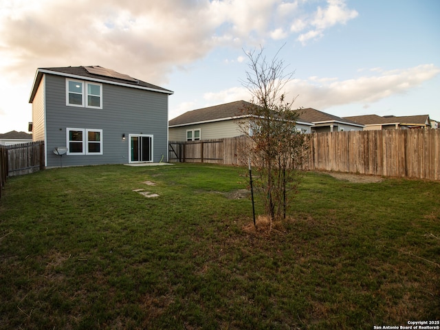 13514 Flower Pond, Saint Hedwig, TX 78152 - back of property featuring roof mounted solar panels