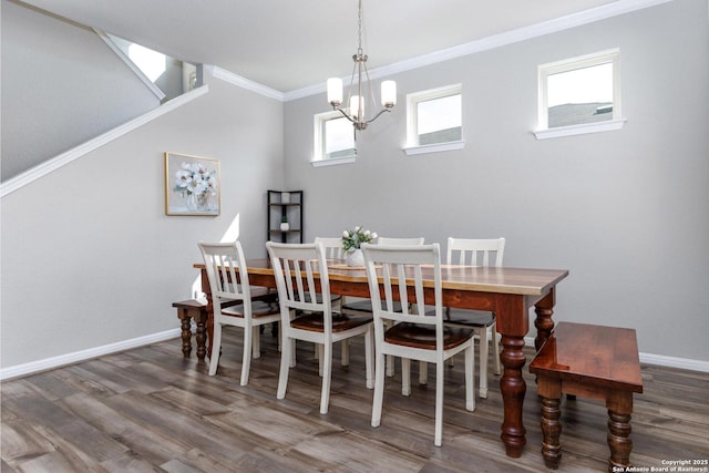 2331 Greystone Lndg, San Antonio, TX 78259 - dining space featuring a chandelier, ornamental molding, baseboards, and wood finished floors