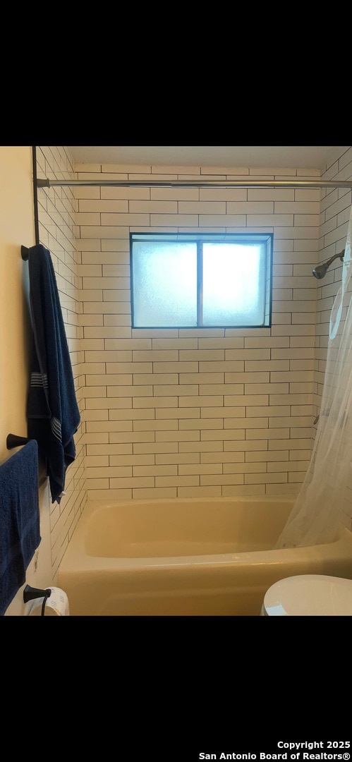 3002 Wroxton, San Antonio, TX 78217 - bathroom with shower / tub combo with curtain and toilet