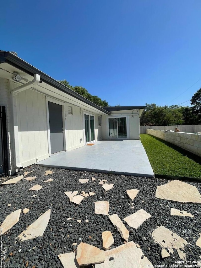 3002 Wroxton, San Antonio, TX 78217 - back of house featuring a patio