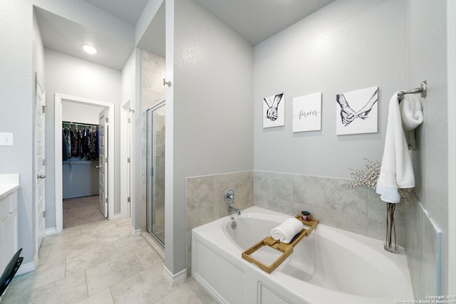 1524 Leeds Park, Bulverde, TX 78163 - full bathroom with a bath, a walk in closet, a stall shower, and vanity