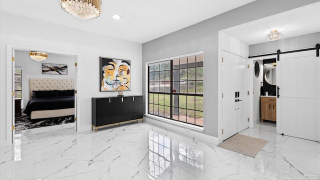 1818 Moreshead, San Antonio, TX 78231 - entrance foyer with a chandelier, a barn door, marble tiled flooring, recessed lighting, and baseboards