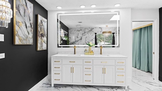 1818 Moreshead, San Antonio, TX 78231 - bathroom featuring marble finish flooring, double vanity, recessed lighting, baseboards, and a chandelier