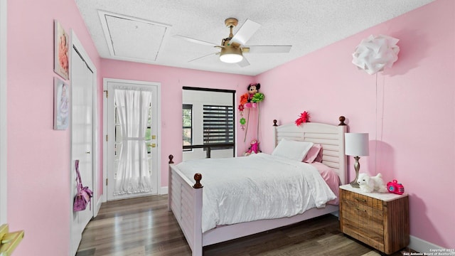 1818 Moreshead, San Antonio, TX 78231 - bedroom featuring attic access, wood finished floors, a textured ceiling, ceiling fan, and baseboards
