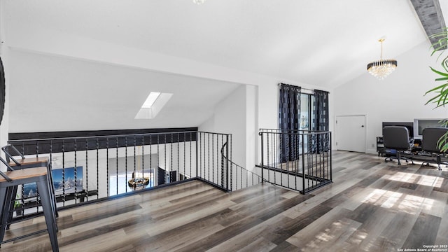 1818 Moreshead, San Antonio, TX 78231 - corridor with lofted ceiling, an upstairs landing, wood finished floors, a desk, and a skylight