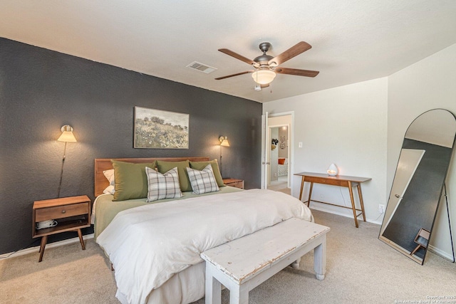 609 San Augustine, New Braunfels, TX 78132 - bedroom featuring light carpet, baseboards, and a ceiling fan