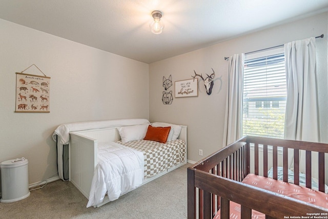 609 San Augustine, New Braunfels, TX 78132 - carpeted bedroom featuring baseboards