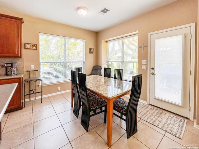 1031 Starlit Pond, San Antonio, TX 78260 - dining area with plenty of natural light, baseboards, and light tile patterned floors