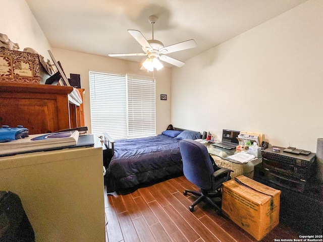 1031 Starlit Pond, San Antonio, TX 78260 - bedroom featuring dark wood-style flooring, ceiling fan, and an office area