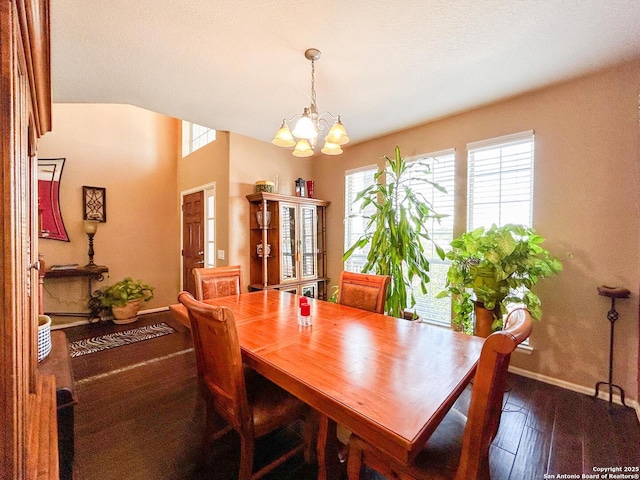 1031 Starlit Pond, San Antonio, TX 78260 - dining area featuring a chandelier, wood-type flooring, and baseboards