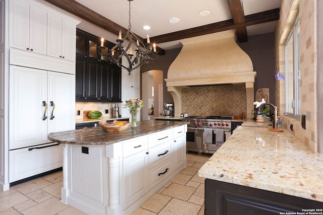 1818 Palmer Vw, San Antonio, TX 78260 - kitchen featuring double oven range, beam ceiling, decorative backsplash, a sink, and custom range hood