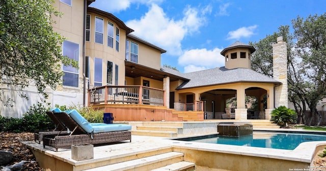 1818 Palmer Vw, San Antonio, TX 78260 - back of house featuring stucco siding, an outdoor pool, roof with shingles, stairs, and a chimney