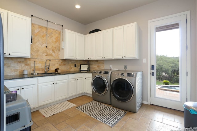 1818 Palmer Vw, San Antonio, TX 78260 - washroom with independent washer and dryer, recessed lighting, cabinet space, and stone tile floors