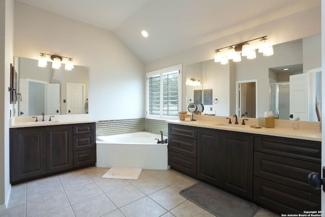 1818 Palmer Vw, San Antonio, TX 78260 - full bathroom featuring tile patterned flooring, two vanities, a garden tub, a shower stall, and lofted ceiling