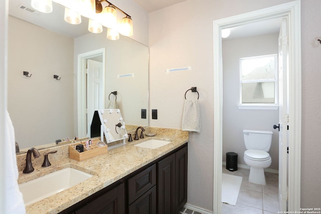 1818 Palmer Vw, San Antonio, TX 78260 - full bath featuring double vanity, toilet, and tile patterned flooring
