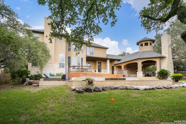 1818 Palmer Vw, San Antonio, TX 78260 - rear view of house with a lawn, stucco siding, and stone siding