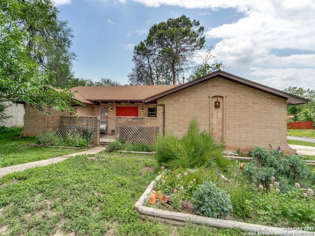 6802 S Forest Hvn, San Antonio, TX 78240 - single story home with brick siding and a front lawn
