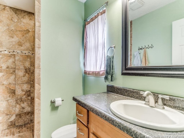 6802 S Forest Hvn, San Antonio, TX 78240 - full bath featuring vanity, a tile shower, and toilet