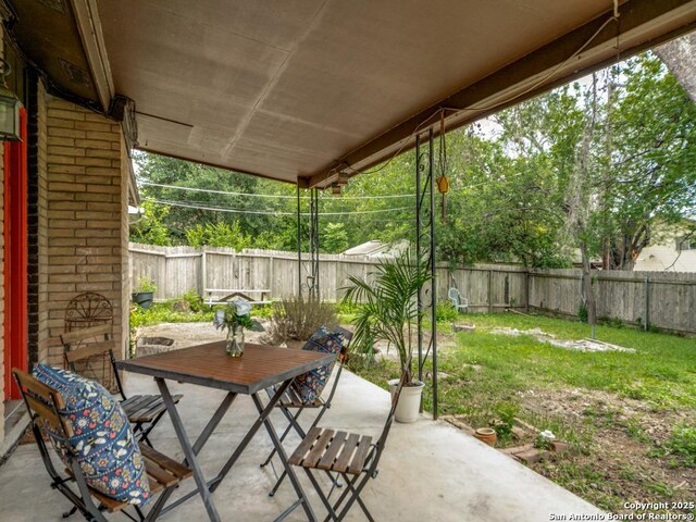 6802 S Forest Hvn, San Antonio, TX 78240 - view of patio featuring outdoor dining area