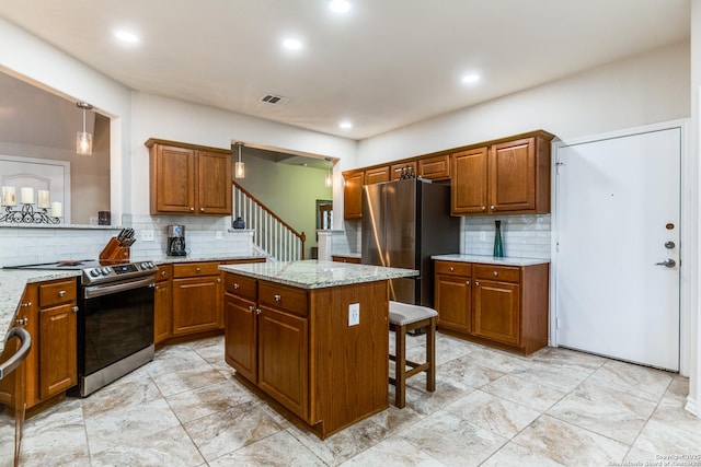 1342 Pinnacle, San Antonio, TX 78260 - kitchen with stainless steel appliances, backsplash, brown cabinetry, light stone countertops, and recessed lighting